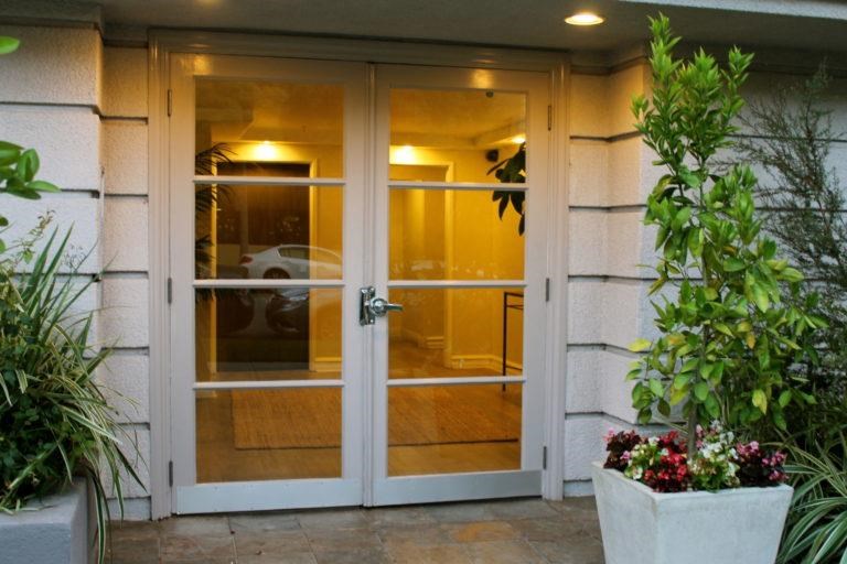 the doors of a building with glass doors