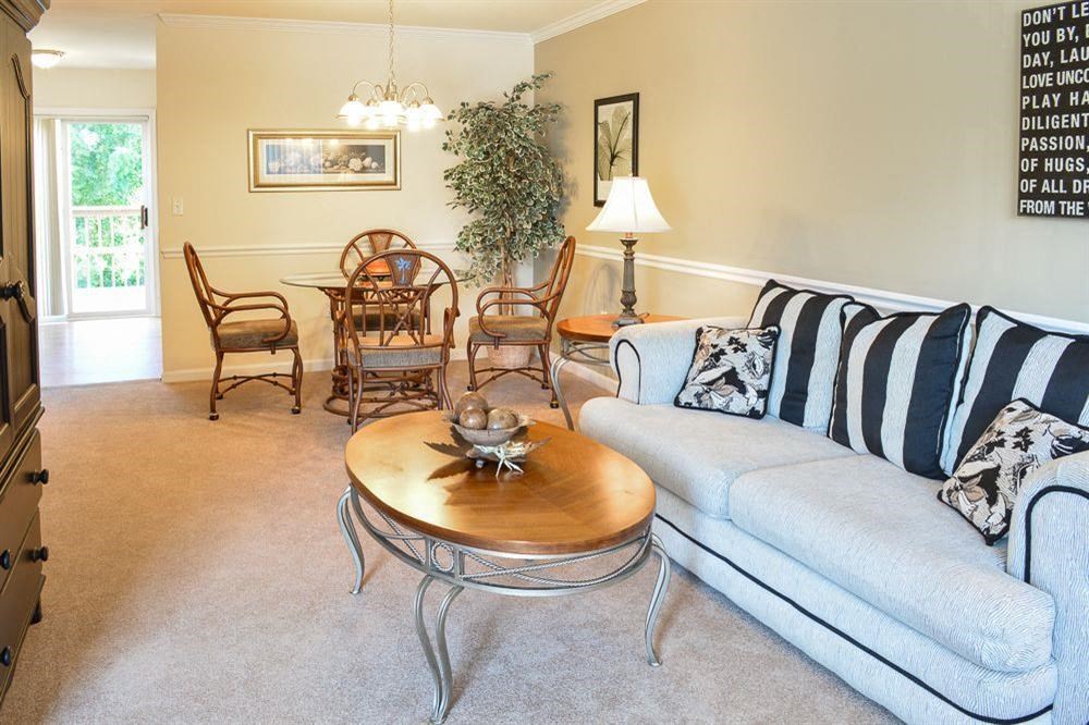 a living room with a couch and a table