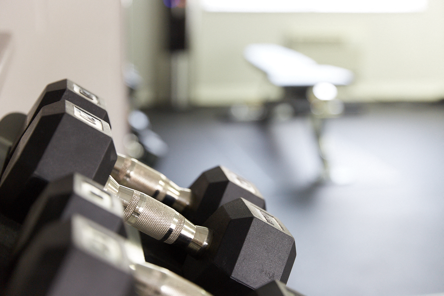 a row of weights in a gym