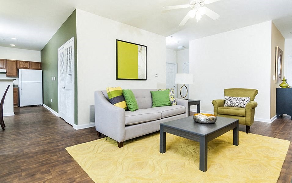 a living room with a couch and a table