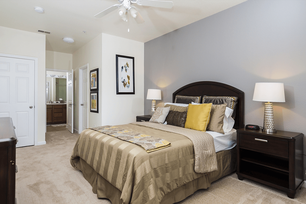 a bedroom with a bed and a closet