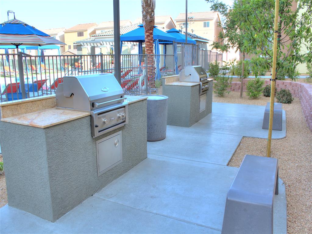 Community gas grills near the pool