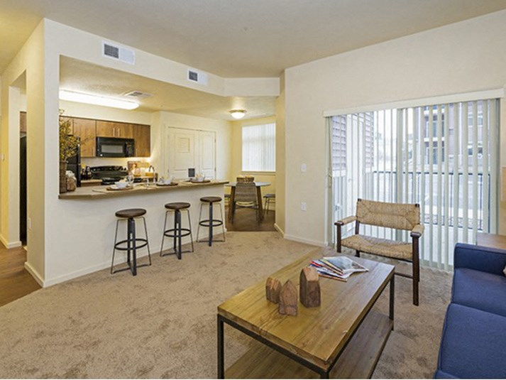Full kitchen with dining area view Parker CO Apartment Rentals at Copper Steepe 