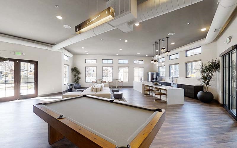 Clubhouse with pool talbe  l Azure Apartments in Sparks NV