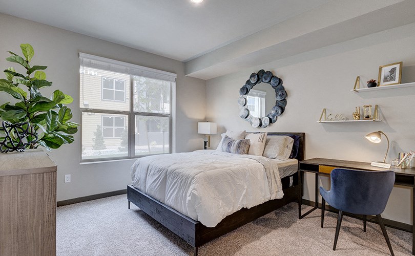 Bedroom with window l Azure Apartments in Sparks NV