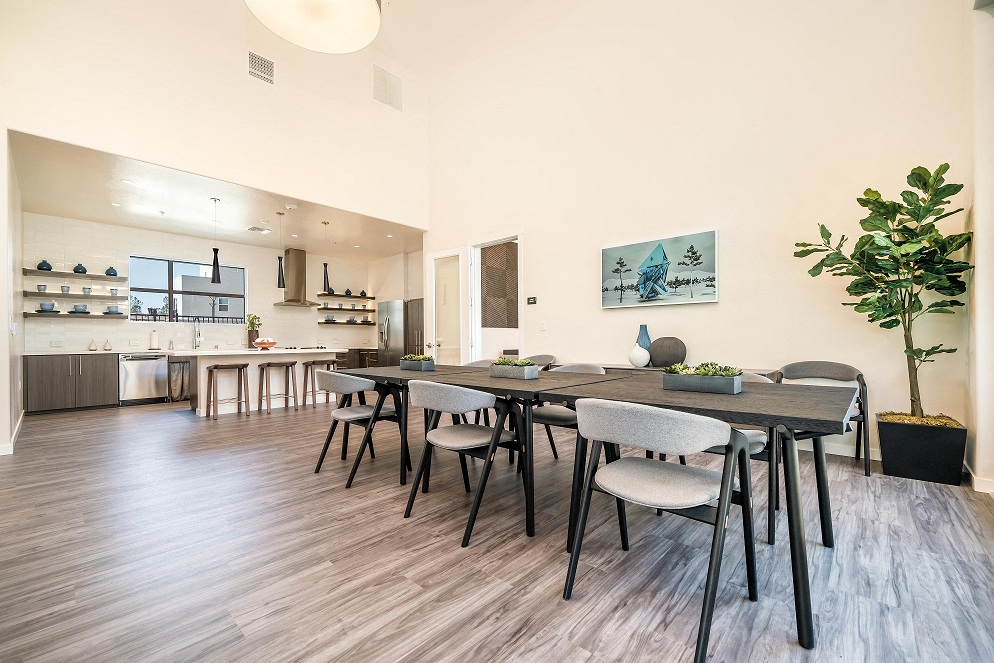 Two Bedroom apartments in Folsom CA - Hub Apartments - Clubhouse with with Social Room, Full Demonstration Kitchen, and Fireplace