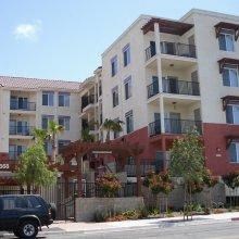 Exterior view of building l Los Vientos Apartments in San Diego CA