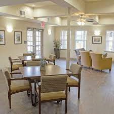 Indoor seating area with tables and chirs