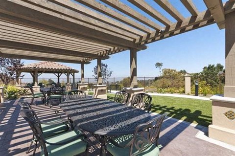 BBQ area seating l Mirandela Apartments in Rancho Palos Verdes