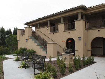 Exterior building near bench l Mirandela Apartments in Rancho Palos Verdes