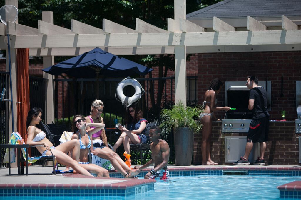 Poolside Relaxing Area at Monroe Place Apartments, Georgia, 30324