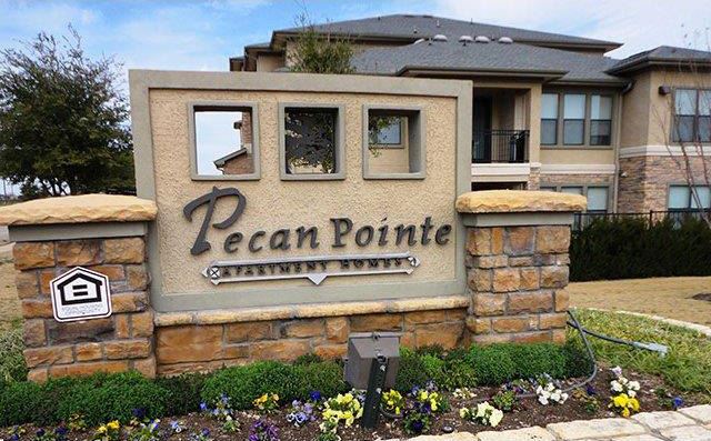 Property entrance sign Temple, Texas Apartments For Rent l Pecan Pointe Apartments - Photo Gallery 1