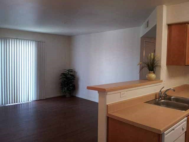 Kitchen and living room   l Santa Fe Apartments in Bakersfield CA
