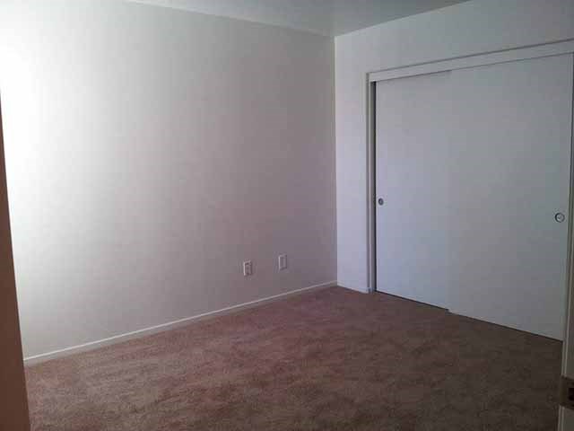 Bedroom closet   l Santa Fe Apartments in Bakersfield CA