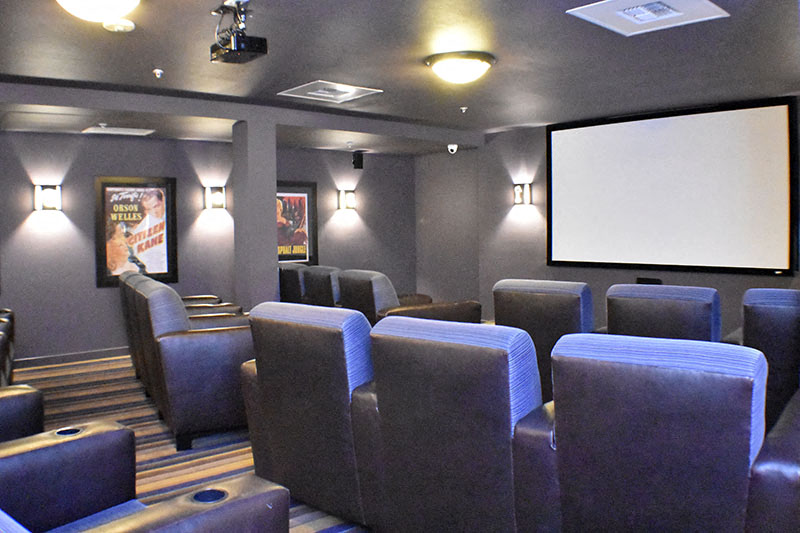 Movie Theatre Room with seating Traditions at Englewood Senior Apts for rent in Englewood CO 80113