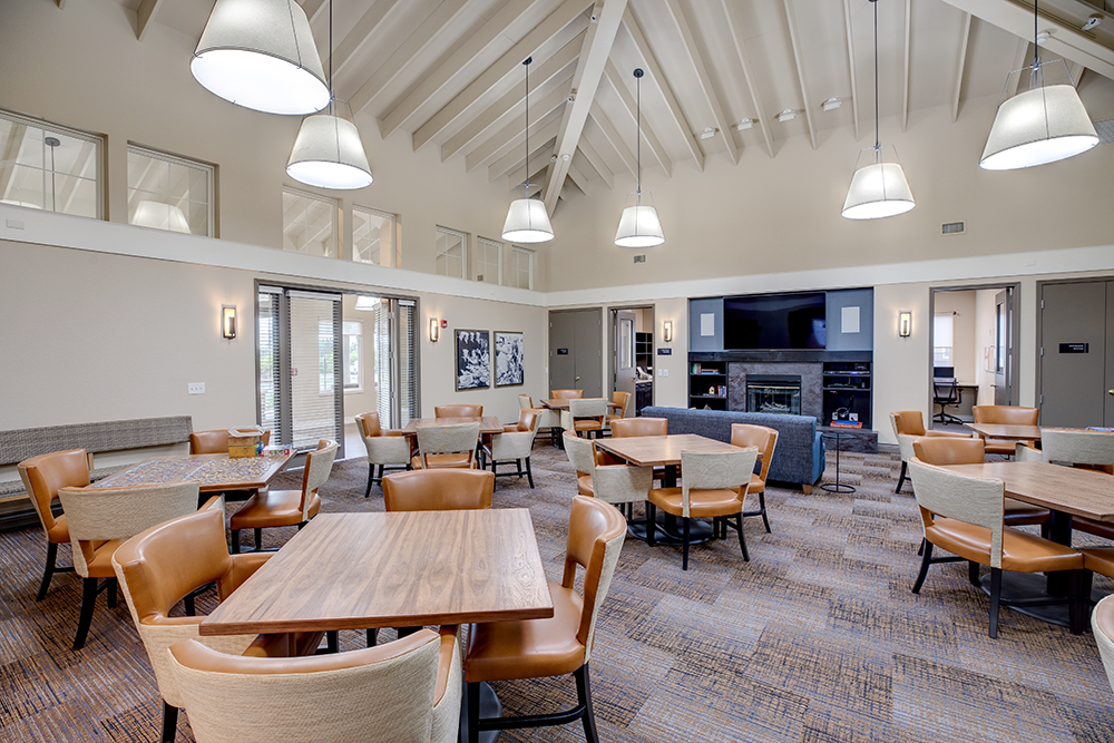 Dining area with fireplace Dining area with fireplace at VINTAGE AT BENNETT VALLEY, Santa Rosa