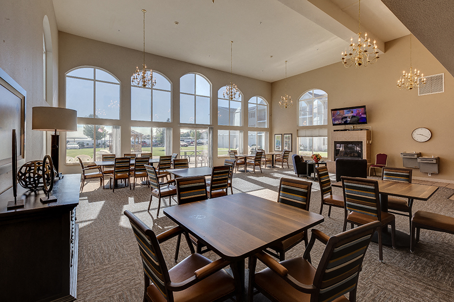 Social Room with Fireplace and Full Kitchen l Vintage at Richland Senior Apartments in Richland Wa