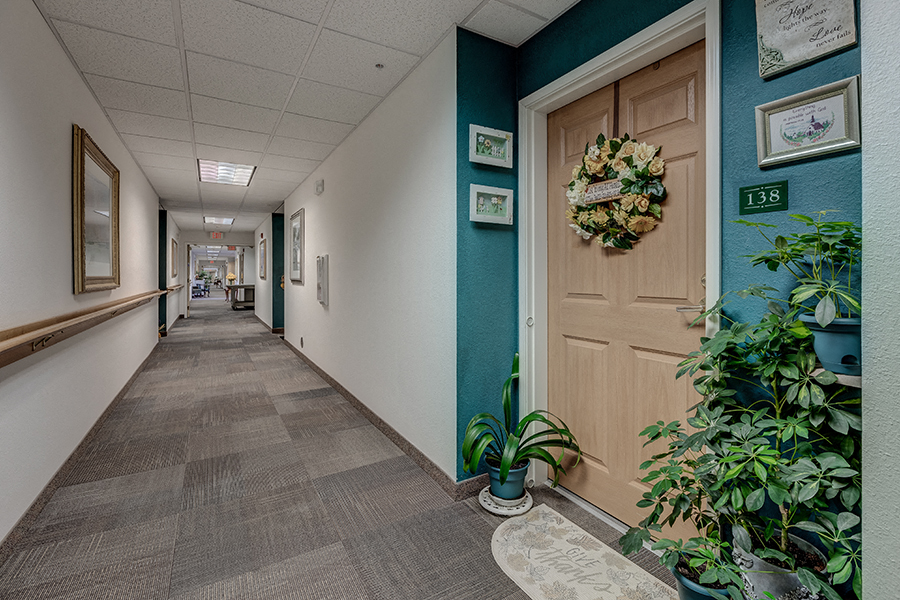 Hallway to apt doors Sequim WA 98382 Apts For rent l Vintage at Sequim Senior Apartments 