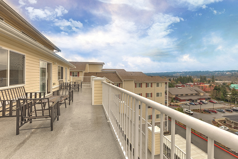 Balcony Seating Silverdale, WA 98383 l Vintage at Silverdale Apt Renatls