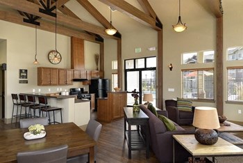 Clubhouse with seating and kitchen Copper Peak Apartment Rentals | Longmont, CO 99337  - Photo Gallery 3