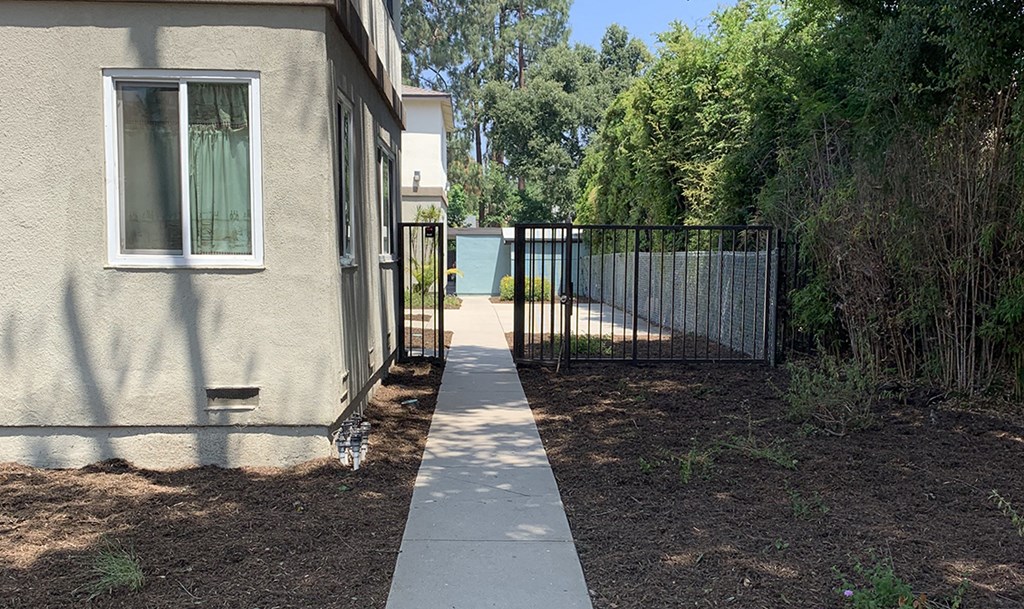 Side view of building and sidewalk