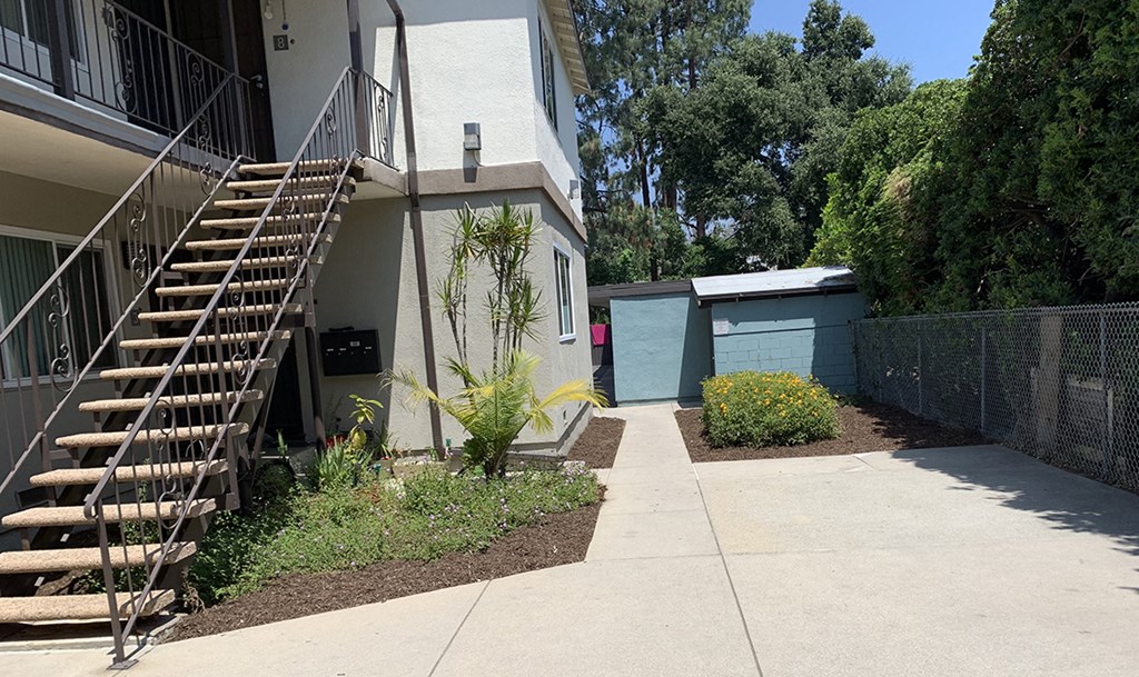 Side view of building and sidewalk