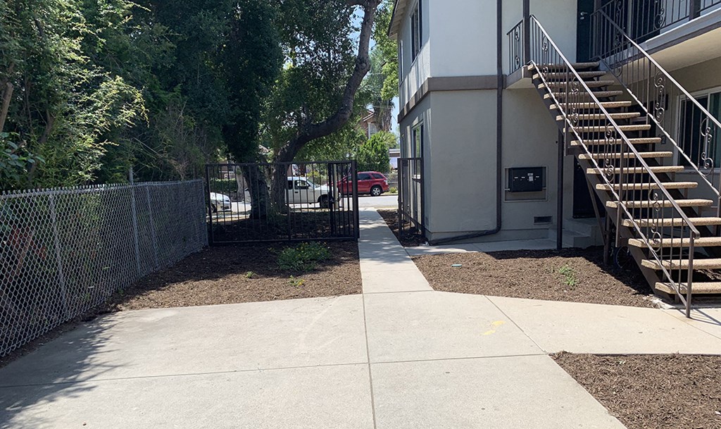 Side view of building and sidewalk
