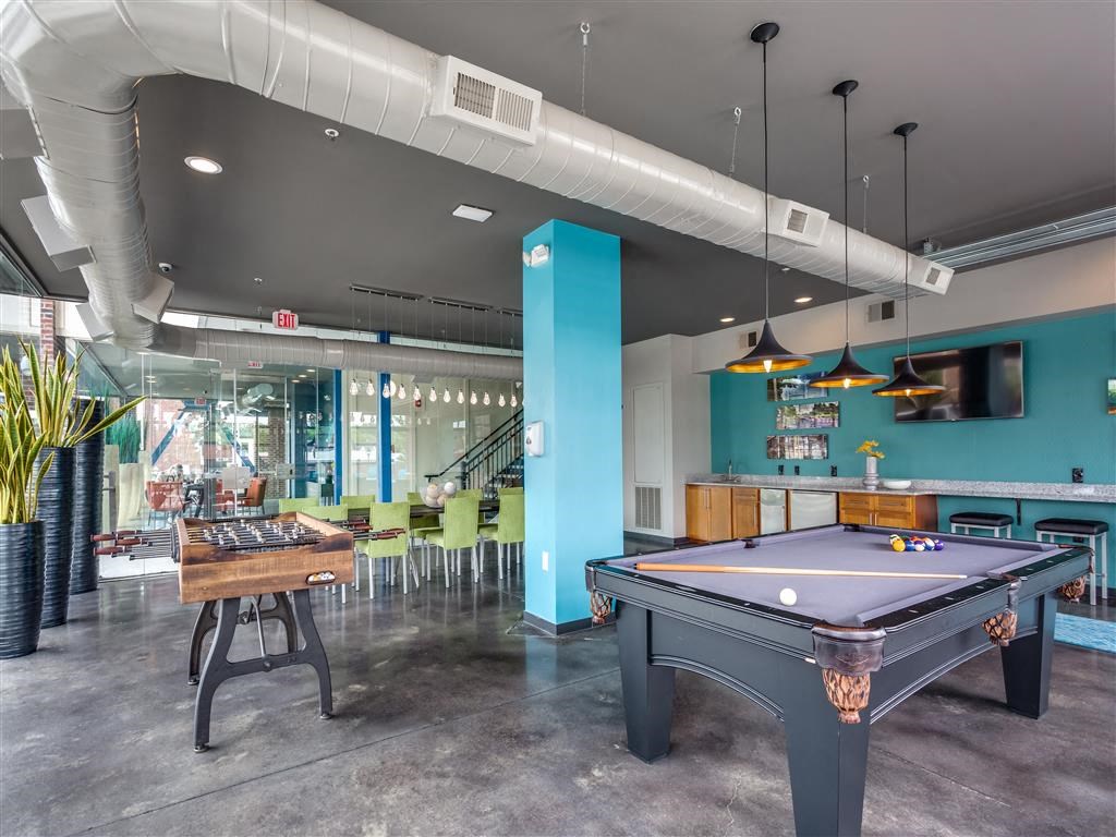 Community Room with Pool Table and Foosball at Greenway at Fisher Park, Greensboro, NC, 27401