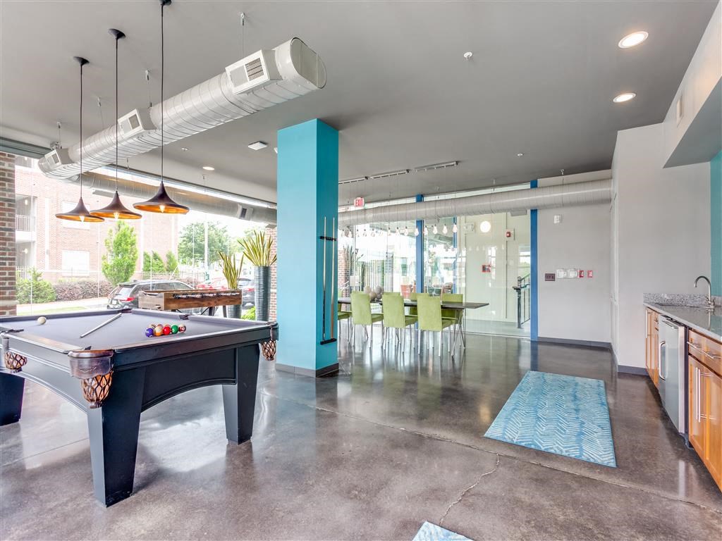 Community Room view of Pool Table and Kitchen Area at Greenway at Fisher Park, Greensboro, 27401