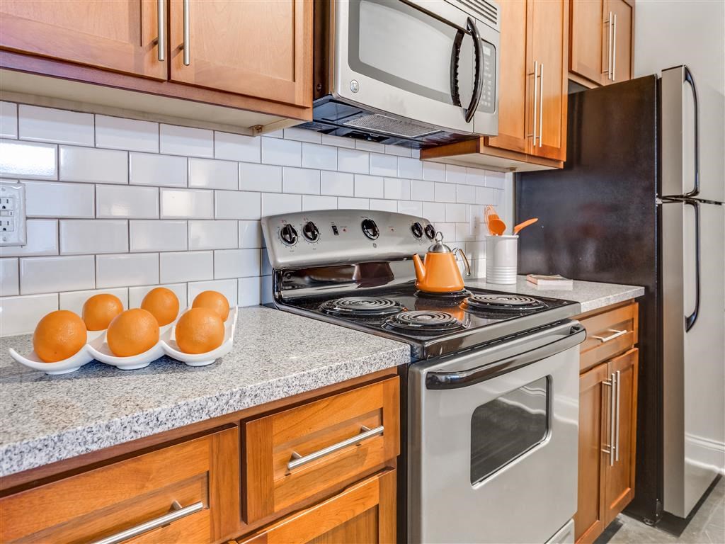 Electric Range In Kitchen at Greenway at Fisher Park, Greensboro, 27401