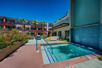 Resort-Style Swimming Pool with Expansive Deck and Spa