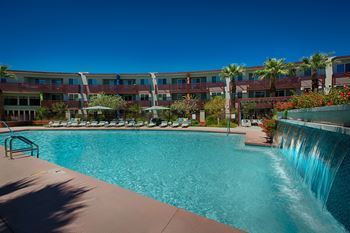 Resort-Style Swimming Pool with Expansive Deck and Spa
