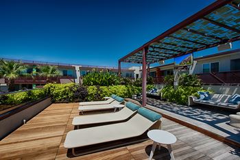 Rooftop Sky Terrace with Covered Cabanas and Fireplace