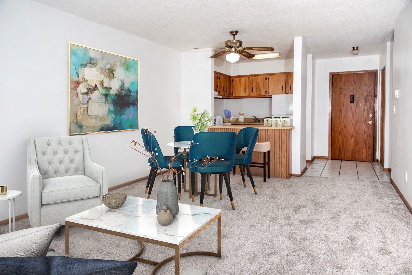 a living room and dining room with a table and chairs