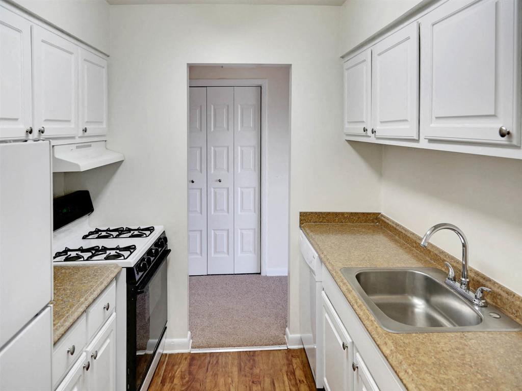 Ample cabinet space and area for food prep are in every kitchen.