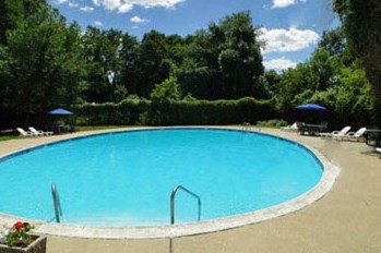 Residents enjoy a refreshing pool, fitness center, and planned community events.