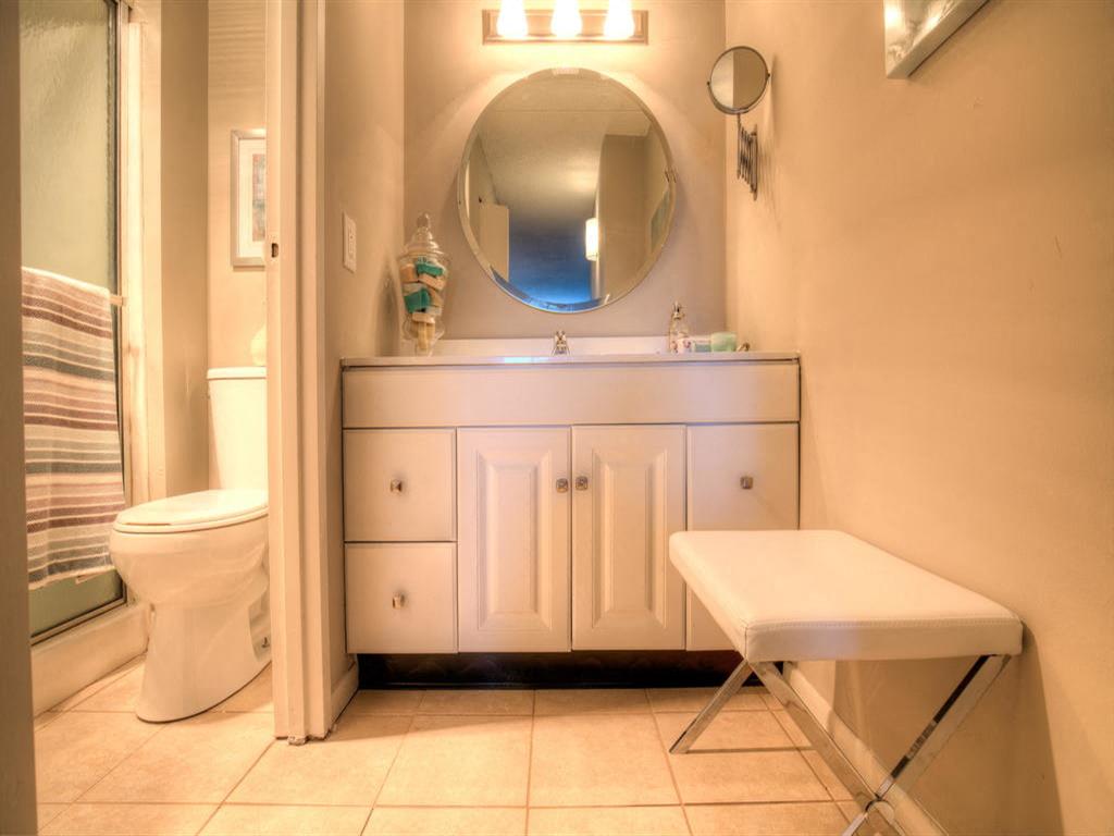 Cabinet storage is abundant in every bathroom.