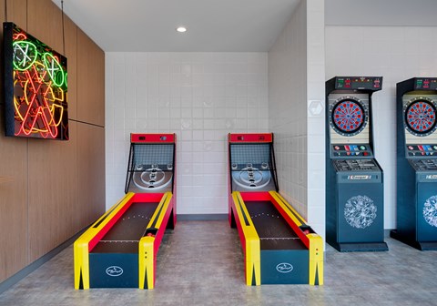 the game room has three arcade machines and two video games