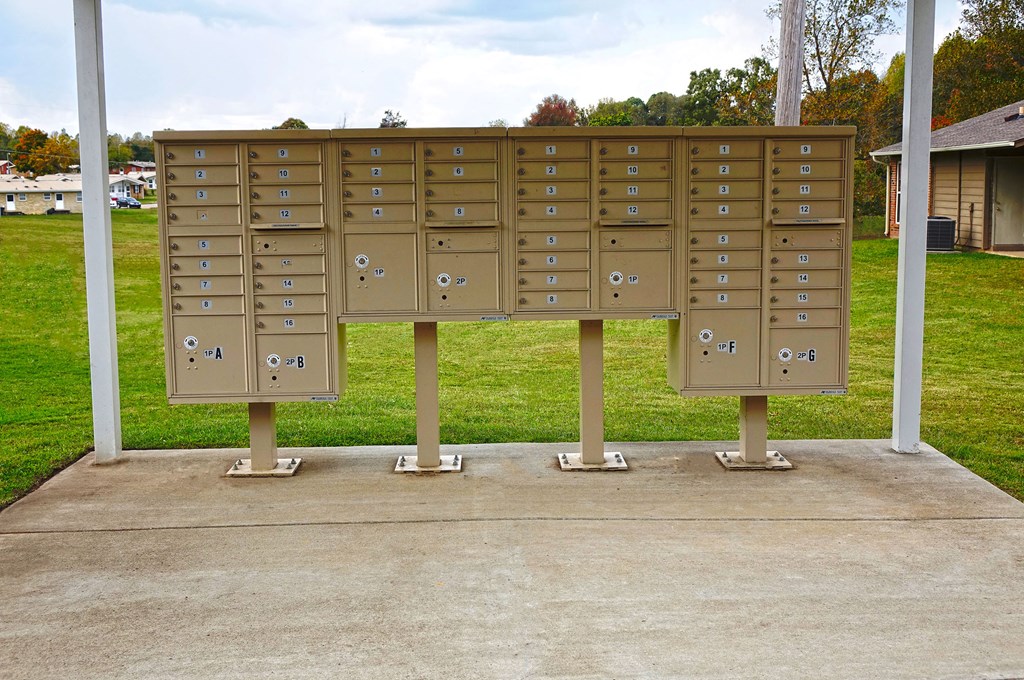 a group of lockers sitting on a sidewalk