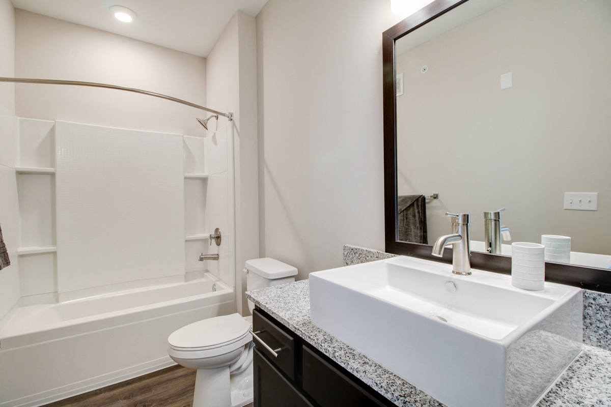 Bathroom with Vanity Mirrors at The Edison at Peytona, Gallatin, TN,37066