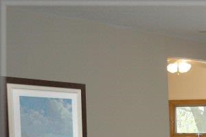 Bass Lake Crossing Apartment Living Room with Light Grey Carpet and Sliding Glass Door to Balcony
