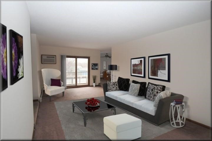 a living room with a couch and a table