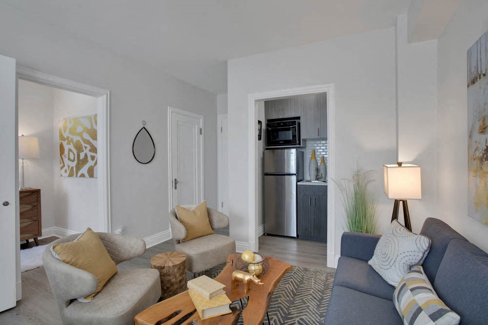 a living room with a couch and a table