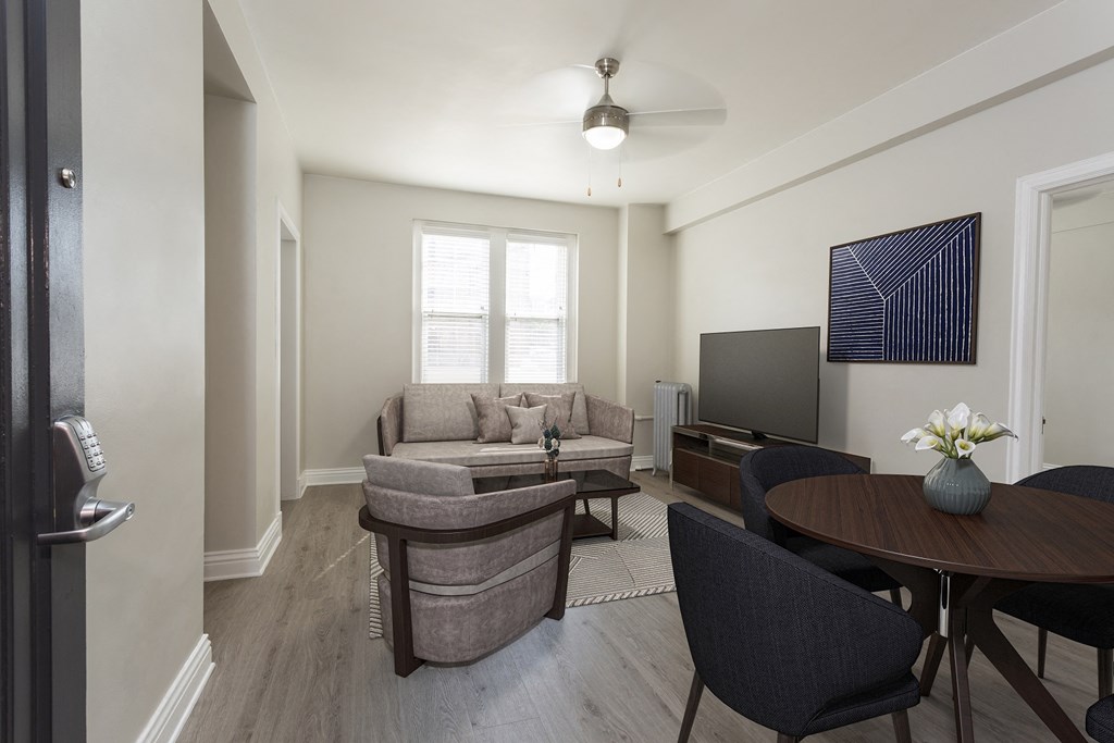 a living room with a couch and a table