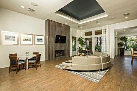 A living room with a fireplace and a couch.