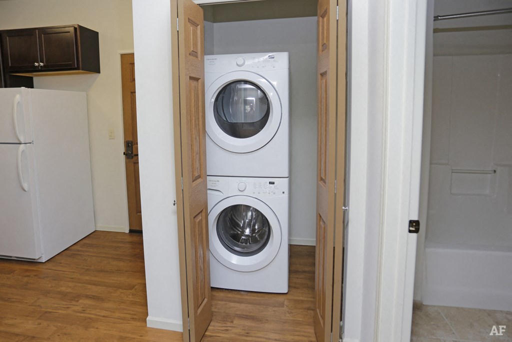 a washing machine and dryer in a laundry room