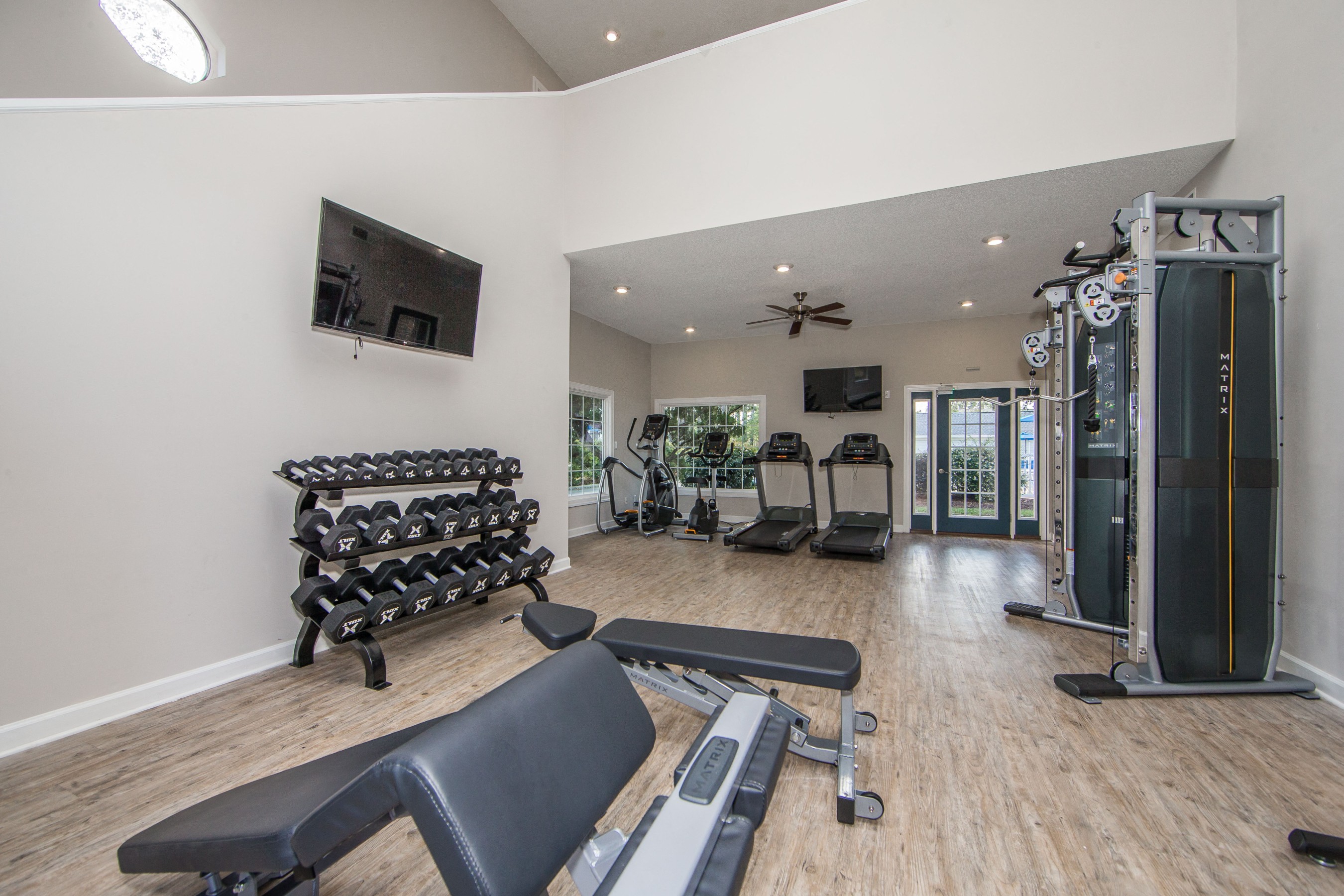 Gym with weights and treadmills at St. Croix Apartments in Virginia Beach VA