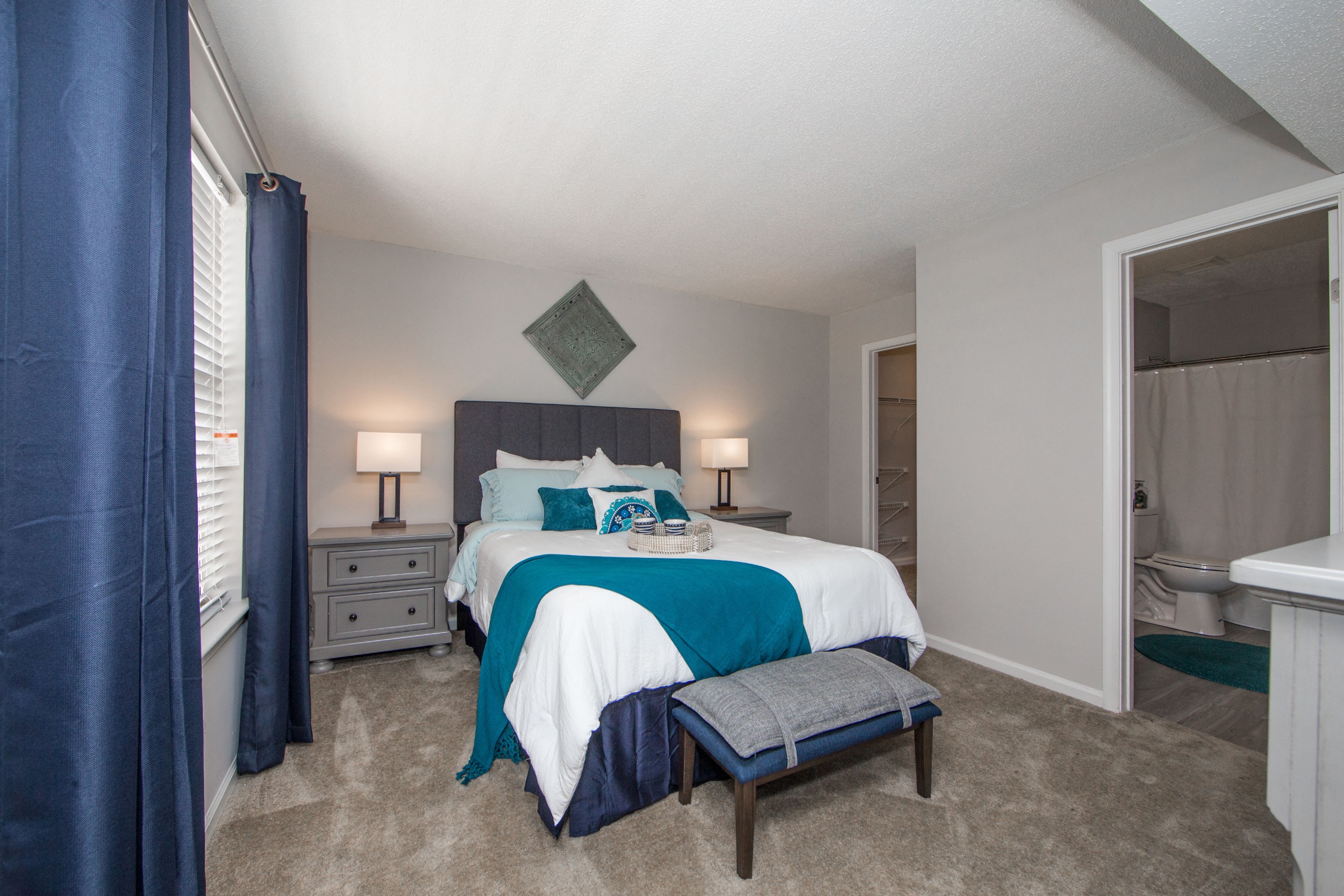 Natural lighting in master bedroom at St. Croix Apartments in Virginia Beach VA