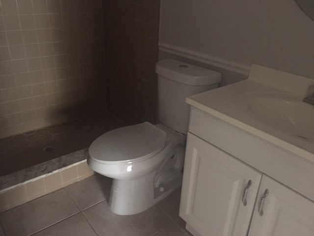 a bathroom with a toilet and a sink