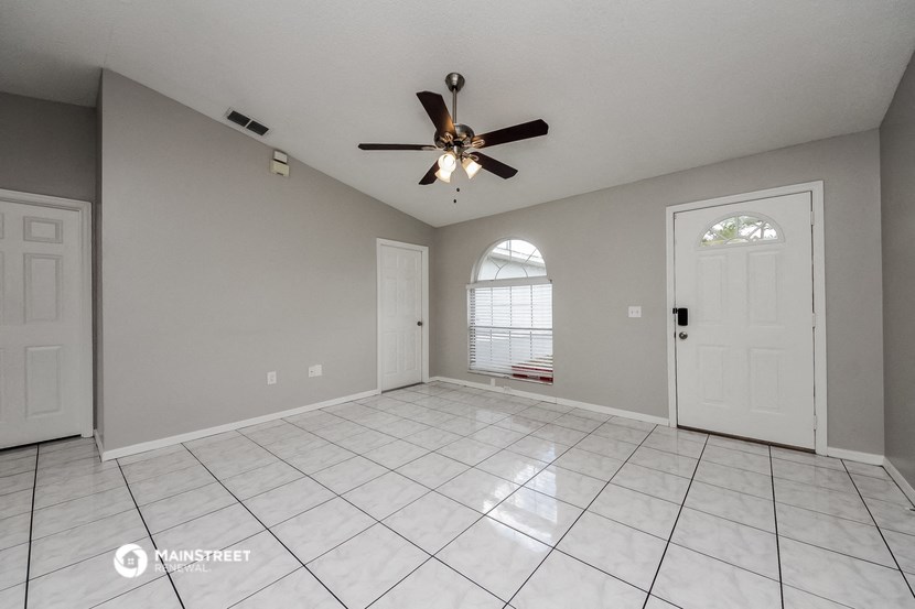 the spacious living room is clean and ready for you to use